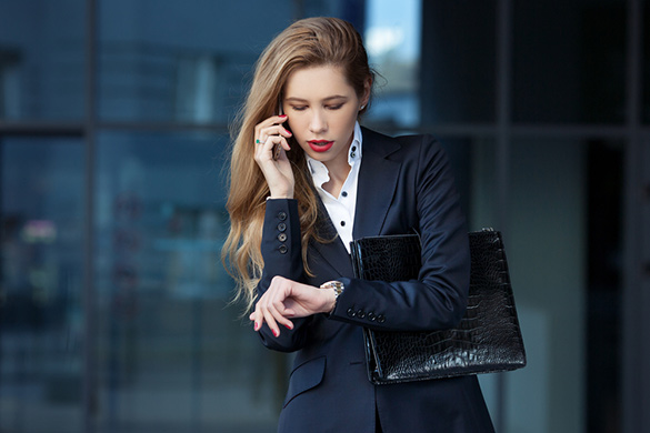 beautiful-business-woman-looking-what-time-is-it